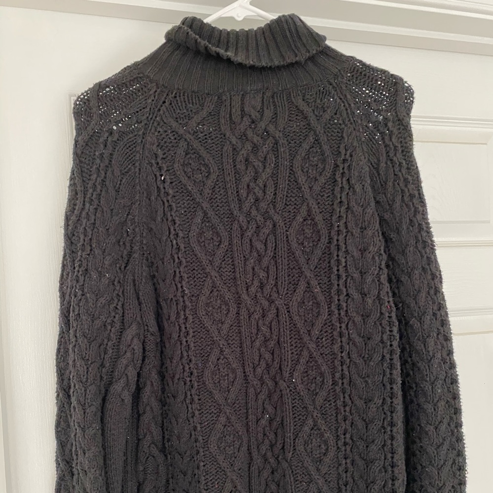 Black turtleneck sweater.  NEVER WORN!!
